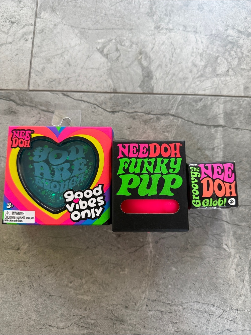 NeeDoh Funky Pup, groovy heart, and blue groovy glob set